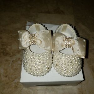 Baby girl beaded shoes and bow